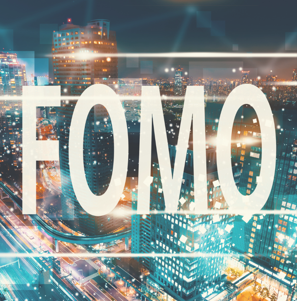 Large bold text reading 'FOMO' overlaid on a brightly lit cityscape at night, with glowing digital effects suggesting technology, connectivity, and the fast pace of modern life.